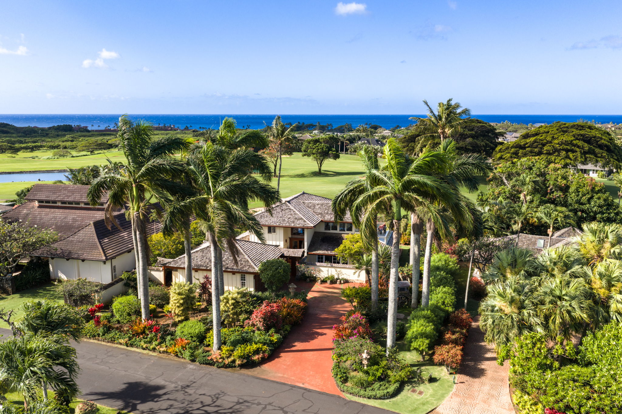 Aerial of 2661 Puuone St in Kiahuna Golf Village with tropical gardens