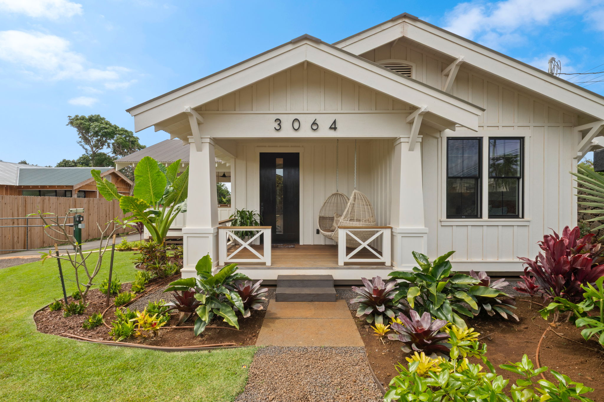 Craftsman front porch exterior of 3064 Poipu Rd #1 — new construction in Po'ipu Mauka Village